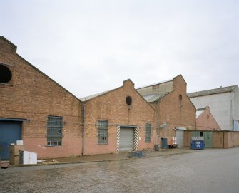 View from SW of central bays of former Plumbers' shops