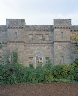 Detail of NE face of W wing showing venetian window to original kitchen