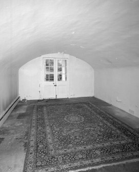 Interior. Basement View of vaulted E entrance hall from SW