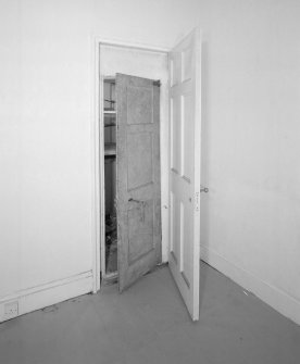 Interior. 1st floor Detail of SE bedroom tower cupboard safe