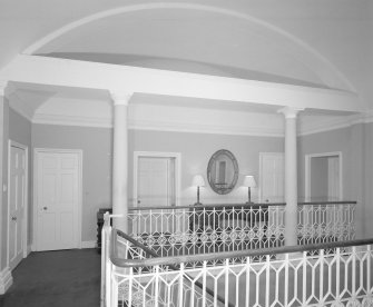 Interior. 2nd floor View of landing from S showing columned screen and vaulted ceiling