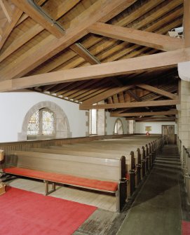 Interior, view of W aisle showing roof detail. From S.