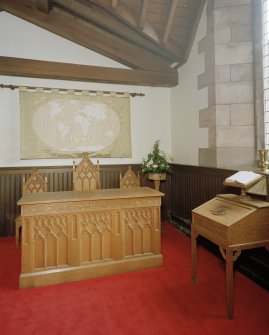 Interior, detail of communion table and chairs in W aisle