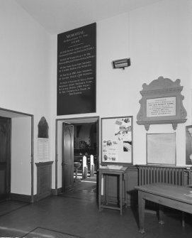 Interior, detail of entrance hall from N showing memorials