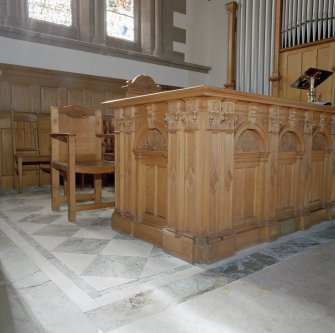 Interior, detail of communion table and marble floor gifted in memory of William Mackie 1905.