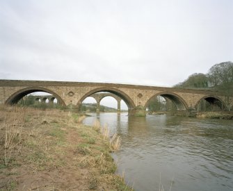 View from SW of centre of SW elevation of bridge, with North Water Viaduct visible in background