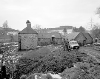 View from NE of NE side of mill, also showing adjacent buildings (right)