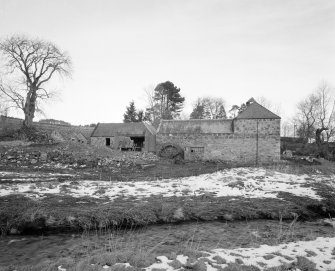View from SW of SW side of mill, showing water wheel