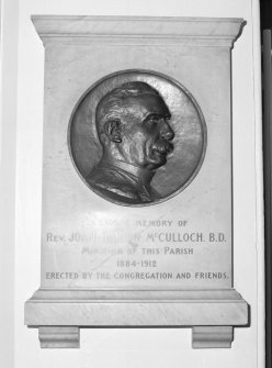 Interior, detail of memorial plaque with portrait to Rev JH McCulloch