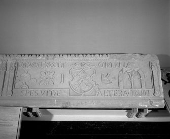 Interior. Detail of right side of former fireplace lintel with inscription "DEUS FACIT OMNIA. SPES VITAE ALTERA 1611"