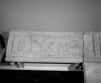 Interior. Detail of right side of former fireplace lintel with inscription "DOMINUS FRUSTRA. VIRTUS SUB UMBRA."
