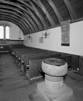 Interior. View of nave showing pews