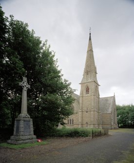 View from S showing tower, steeple and war memorial to left
