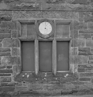 Detail of window and clock in W gable of station building