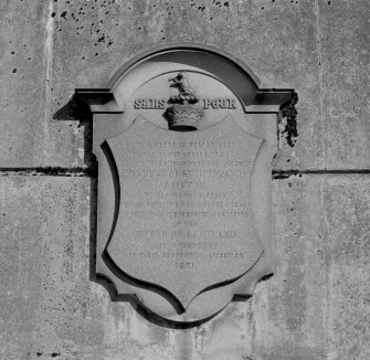 Detail of plaque on SE abutment of road bridge over the railway at N end of platform, commemorating the creation of the Duke of Sutherland's Railway and the completion of the station in 1868