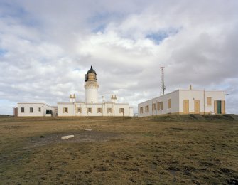 General view of lighthouse and associated keepers' houses and ancillary buildings from SW