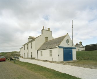 General view of coastguard station and houses from SE