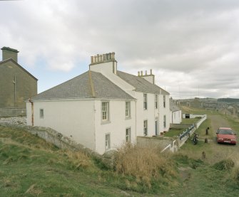 View of houses at N end of coastguard station from W