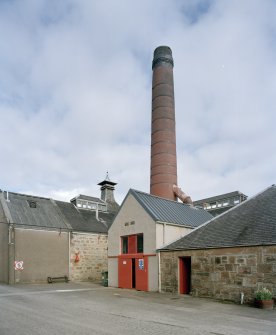 View from S of boiler house and chimney