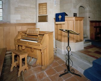 Interior. Detail of pulpit, organ and lectern