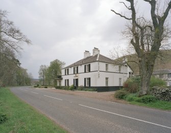 View from NE showing E elevation to road.