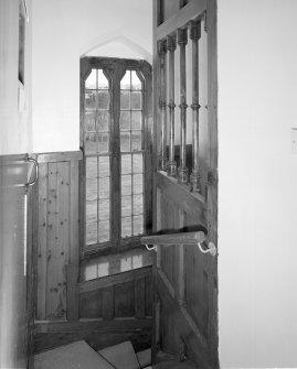 Interior. Detail of staircase showing screen