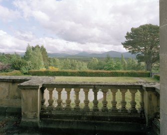 View to S from first floor balcony showing garden and panoramic views