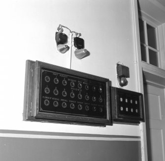 Interior. Detail of electronic bell board