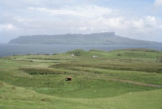 Muck, General. General view looking NE to Eigg from Carn Mhic Asgaill (c NM 417 797).