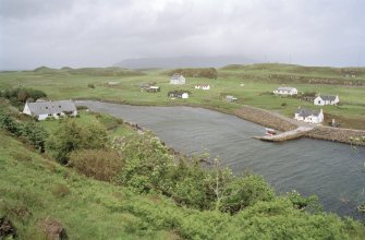 Muck, Port Mor House and Port Mor, Pier Cottage. Hotel, quay, cottage and gear store. View from SW.