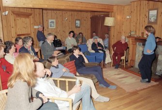 RCAHMS Muck Survey. Angela Gannon giving a talk on the archaeology of the Small Isles in Port Mor House.