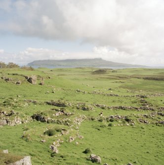 Muck, Sean Bhaile. Township. Details of buildings and kiln barns. View from SW looking across to Eigg.