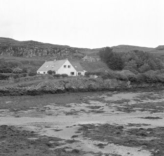 Muck, Port Mor. Port Mor House Hotel and building (NM 4208 7938) on terrace above. View from SE.