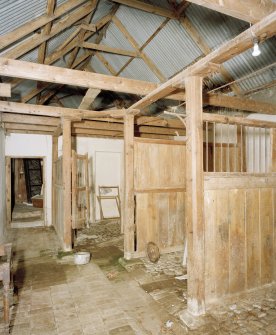 Interior. View of stables and roof structure