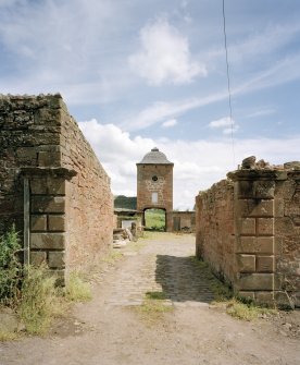 View of gate piers and doocot from West