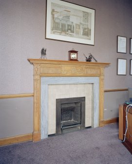 Interior. Detail of 1st floor office fireplace