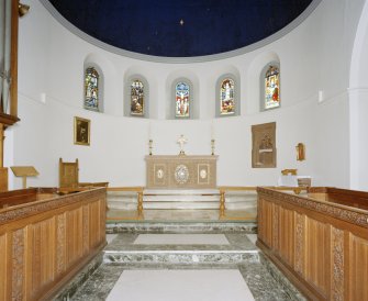 Interior.
View of chancel showing altar, communion rail and choir stalls.