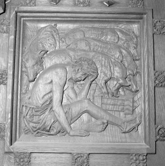 Interior.
Detail of S door carving of the prodigal son designed by Mrs Meredith Williams and carved by W & A Clow c. 1926.