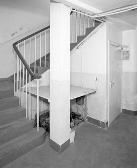 Interior, view of staircase at basement level