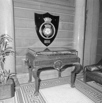 Interior. Ground floor entrance hall detail of roll of honour cabinet