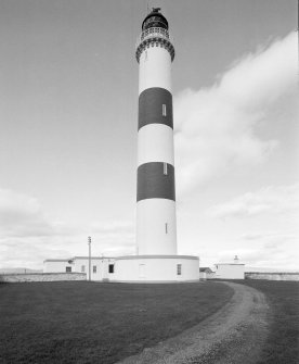 View from S, showing tower and buildings at its base