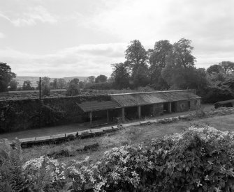 General view from NE showing potting sheds