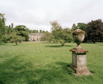 General view from S showing parkland setting and ornamental urn
