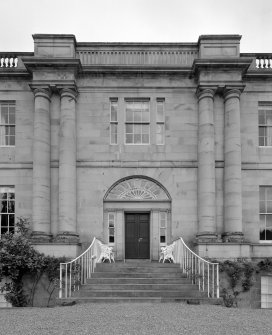Detail of main S entrance showing paired giant order doric columns, fanlighted tripartite entrance and steps