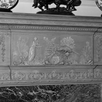 Interior. Detail of dining room timber and gesso with crocodile fireplace