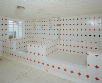 Interior. View of visitors' shower room from SW