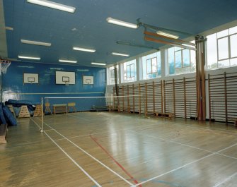 Interior. P.E. /Technical / Youth club wing. View of Gymnasium 2 from WNW