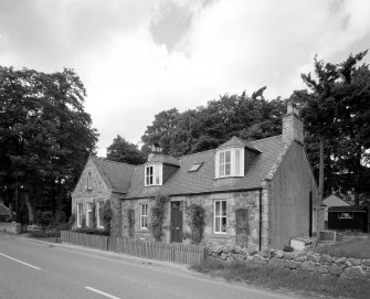View of cottage and former shop at Bridgend to East of West Lodge from SE.