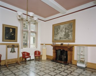 Interior, View of stair hall from North West showing fireplace