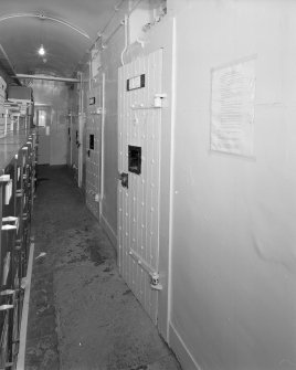 Interior. View of basement cells corridor